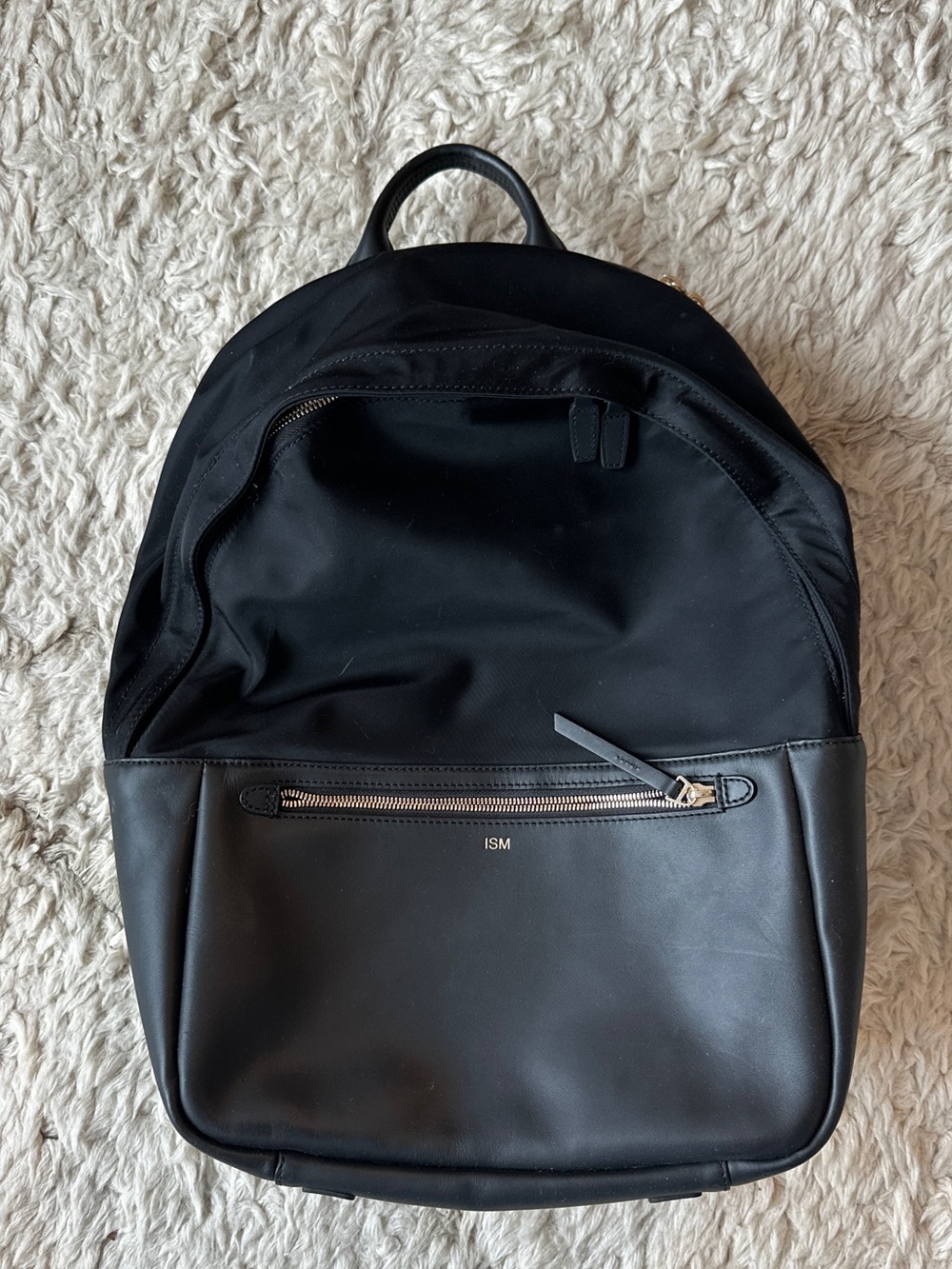 Ism black leather backpack, like new condition